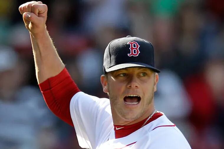 Red Sox pitcher Andrew Bailey (40) reacts after the final out of a baseball game against the Houston Astros at Fenway Park in Boston, Sunday, April 28, 2013. (Mary Schwalm/AP)