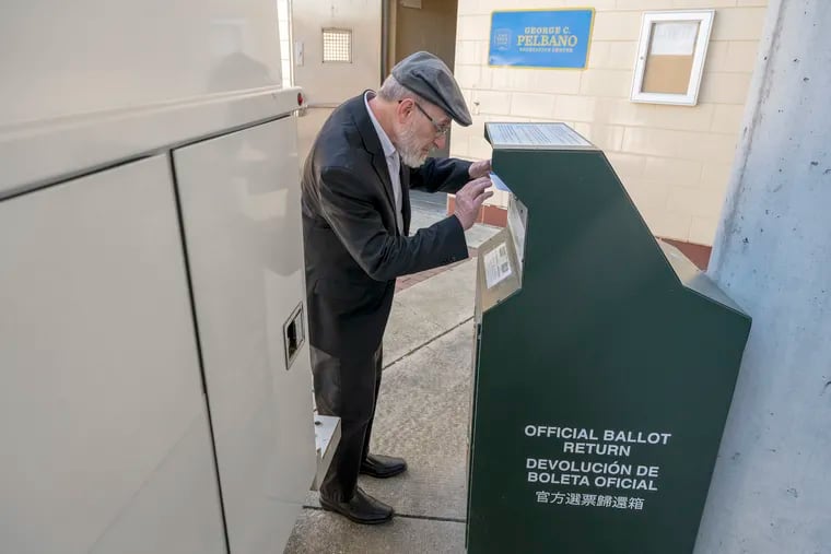 Abraham Meth returns his mail ballot at a dropbox outside the Pelbano Recreation Center in Northeast Philadelphia Monday, April 22, 2024, the day before Pennsylvania primary election day.