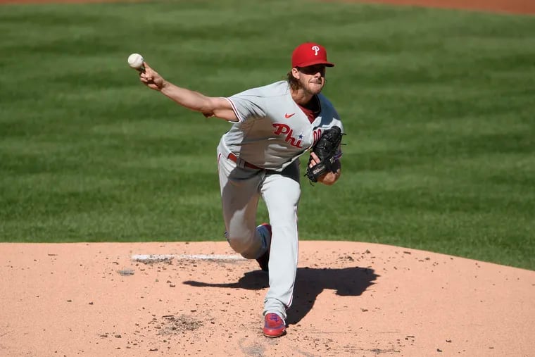 Phillies ace Aaron Nola surrendered four runs on four hits in his team's opening-game loss to the Washington Nationals Tuesday at Nationals Park.