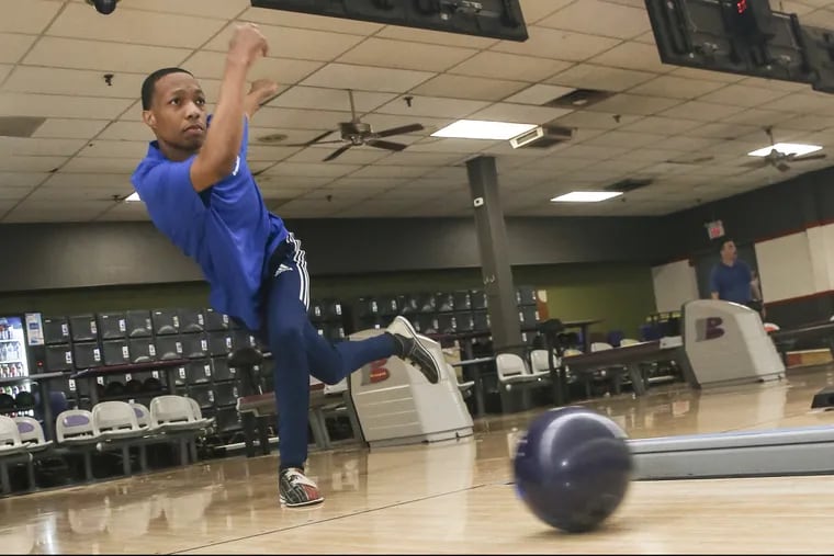 Christopher Johnson, a senior at Lankenau High School, is heading to a North Carolina college on a bowling scholarship that will cover his room and board all four years. At Erie Lanes, Wednesday May 30, 2018 