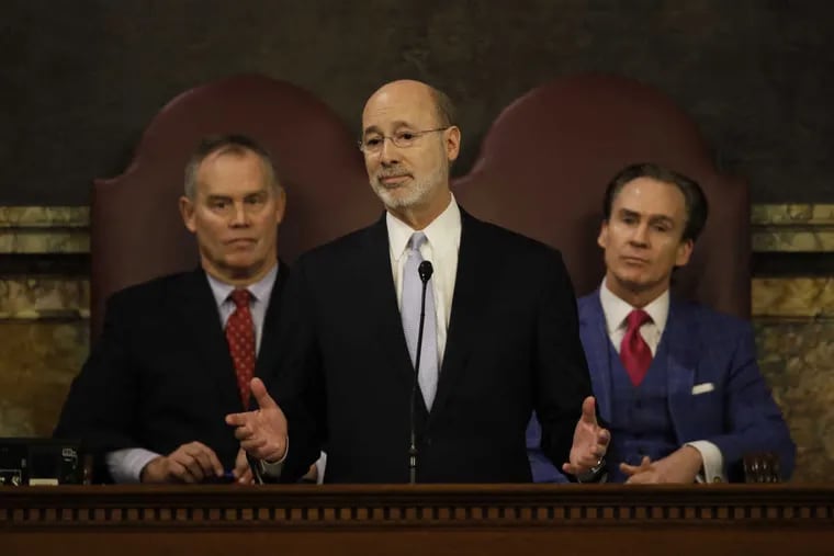 Gov. Tom Wolf delivers his budget address for the 2017-18 fiscal year to a joint session of the Pennsylvania House and Senate in Harrisburg, Pa., Tuesday, Feb. 7, 2017. Speaker of the House of Representatives, Rep. Mike Turzai, R-Allegheny, is at left, and Lt. Gov. Michael Stack, is at right. (AP Photo/Matt Rourke)