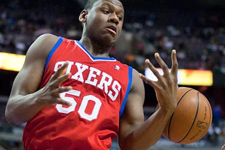 Forward Lavoy Allen grabbed nine boards and scored six points in the Sixers' loss on Thursday. (Duane Burleson/AP)