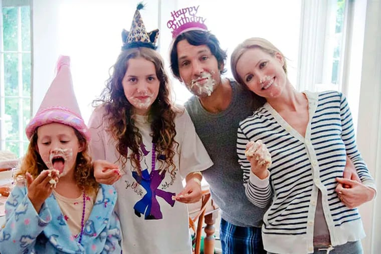 Paul Rudd, Leslie Mann, and Iris (left) and Maude Apatow. Mann is director Judd Apatow's wife, and the girls are theirs.