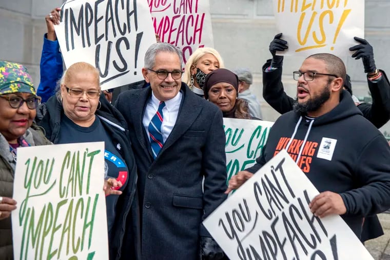 Philadelphia District Attorney Larry Krasner is joined by supporters and political allies outside City Hall on Nov. 21.