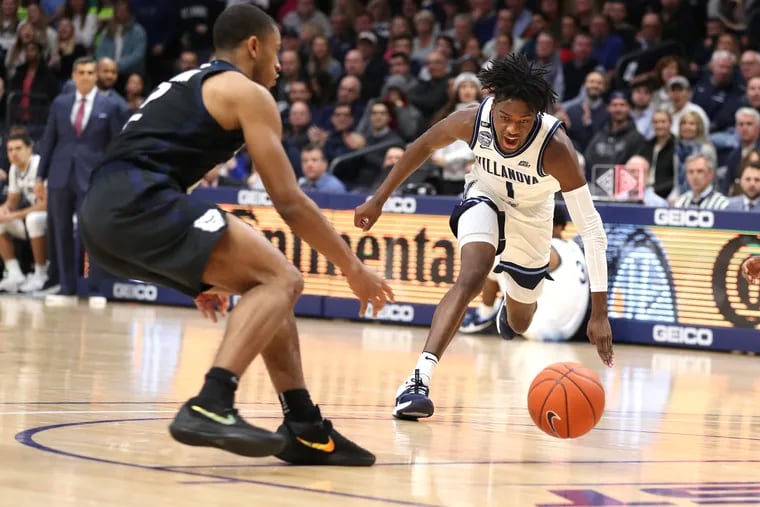 Bryan Antoine, right, of Villanova and Aaron Thompson of Butler going after a loose ball on Jan. 21.
