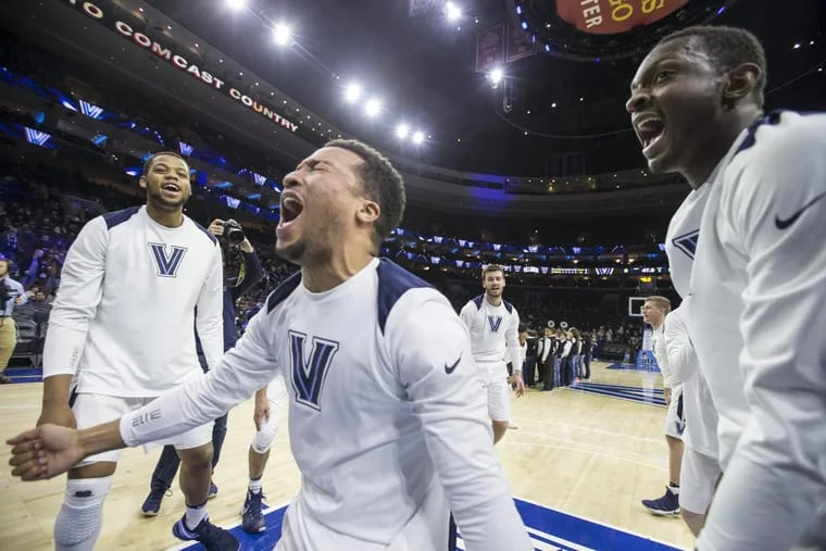 Jalen Brunson, center, of Villanova leads his team in their pre-game ritual before their game against Marquette at the Wells Fargo Center on Jan 6, 2018.