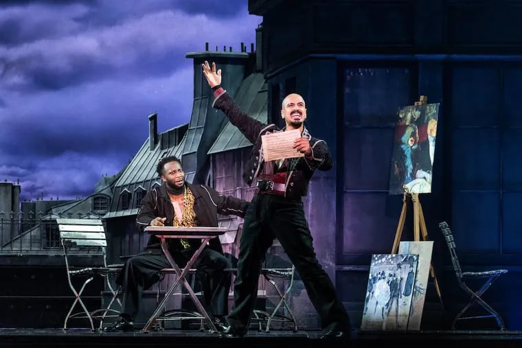 Gabe Martínez as Santiago (right) and Nick Rashad Burroughs as Toulouse-Lautrec on tour in "Moulin Rouge! The Musical." It's at the Academy of Music from July 5-23.