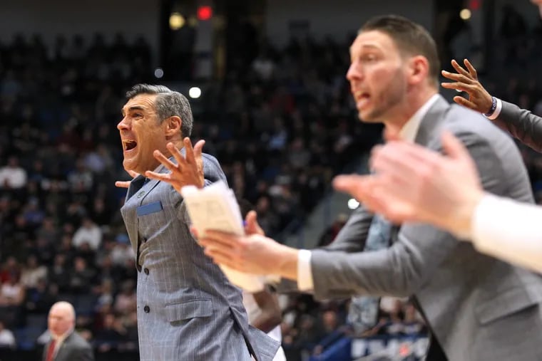 Coach Jay Wright, left, and Mike Nardi of Villanova plead for a foul call against St. Maryâ€™s during 2nd half action in a first round NCAA Tournament game at the XL Center in Hartford, CT on March 21, 2019.