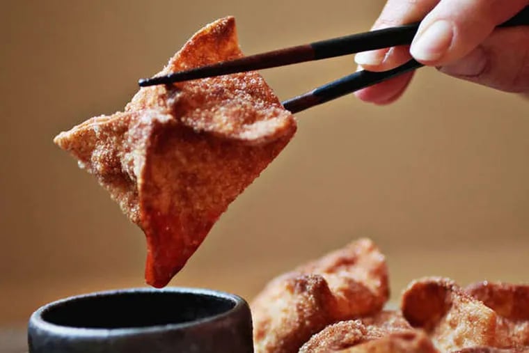 These Crab Rangoons are served with a sweet and sour sauce or plum sauce. (Juli Leonard/News & Observer/TNS)