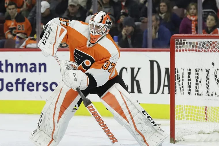 Flyers goaltender Brian Elliott, shown passing the puck against the St. Louis Blues on Jan. 6, will play for the first time in almost two months on Thursday.