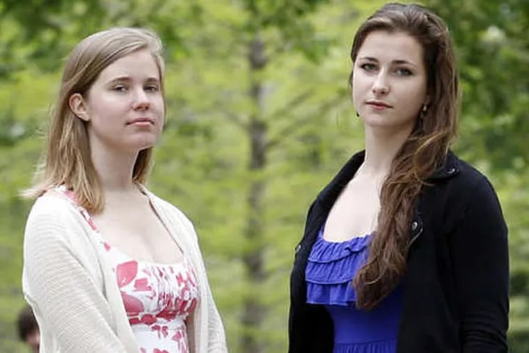 Hope Brinn (left) and Mia Ferguson at Swarthmore College in Swarthmore, Delaware County, on Tuesday, May 7, 2013. The two sophomore students sparked a federal complaint against the college for under-reporting or downplaying cases of sexual assault.  (Yong Kim / Staff Photographer)