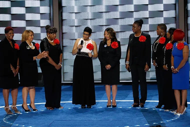 Mothers of the Movement stand on stage during the second night of the DNC at the Wells Fargo Center in South Philadelphia.