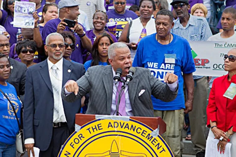 State Sen. Anthony Hardy Williams (D., Phila.) speaks at a rally in Harrisburg against Pennsylvania's new voter-ID law. &quot;Did George Washington have a voter ID card?&quot; he said. &quot;Did John Adams?&quot; ED HILLE / Staff Photographer