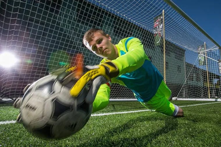 Leyton Thommasen, the goalkeeper for Kennedy Catholic, hasn't let Tourette's inhibit his ability to play soccer, and he plans to continue playing in college in Oregon. (Dean Rutz/Seattle Times/MCT)