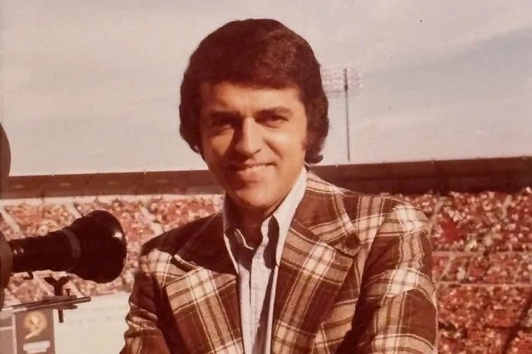 Undated photo of Joe Pellegrino at work at a sports event.