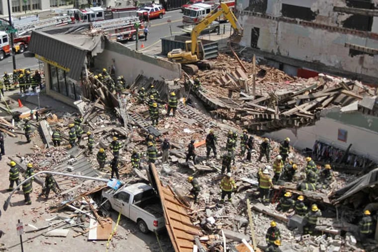 The building collapse at 22d and Market Streets left six people dead and 13 injured. (MICHAEL BRYANT / Staff Photographer)