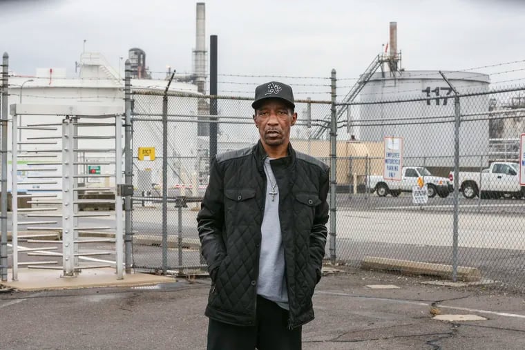 Rodney Ray, pictured here at what is now the former site of the Philadelphia Energy Solutions refinery site, has lived near the refinery all his life, worked in it for a few years, and has health problems.