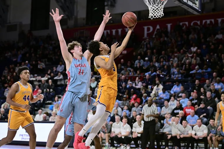 Roman Catholic senior Robert Cottrell goes up for a shot against Father Judge at the Palestra during the Catholic League semifinals last month.