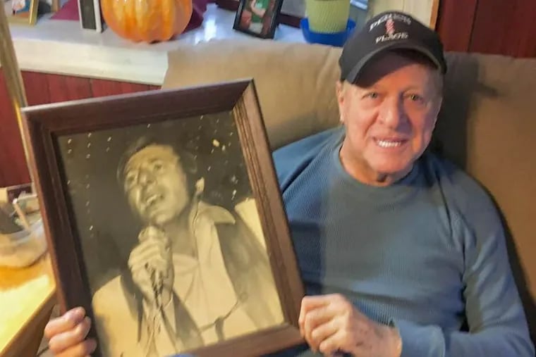 Billy Harner, whose career spanned doo-wop to disco and beyond. at home in Pine Hill. He’s holding a photo that was taken of him performing nearly a half century ago.