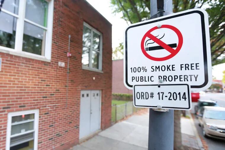 The signs declaring a smoke-free zone went up more than a week ago, surprising many.