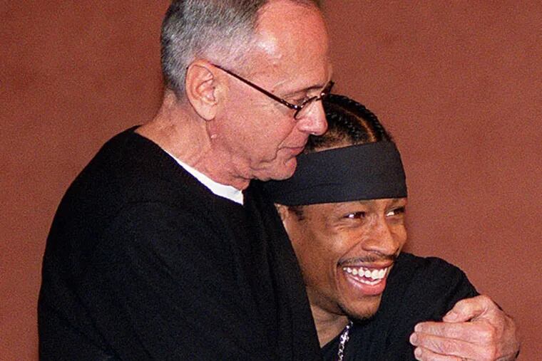 Sixers guard Allen Iverson hugging his coach Larry Brown. (G.W. Miller III/Staff file photo)
