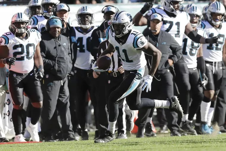 Carolina Panthers wide receiver Torrey Smith runs for a first-down on a fourth down play late in the fourth-quarter against the Eagles on Sunday, October 21, 2018 in Philadelphia. YONG KIM / Staff Photographer