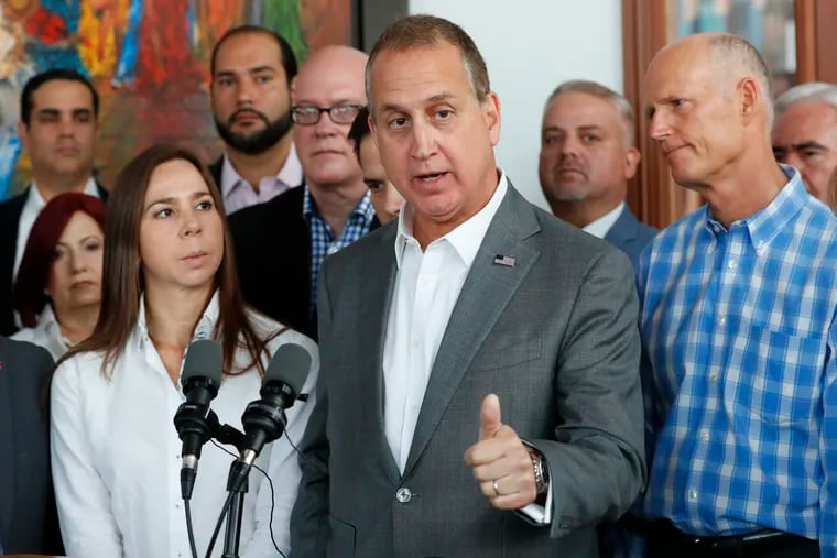 Florida congressman Mario Diaz-Balart (center) speaking at a news conference in May of 2019.