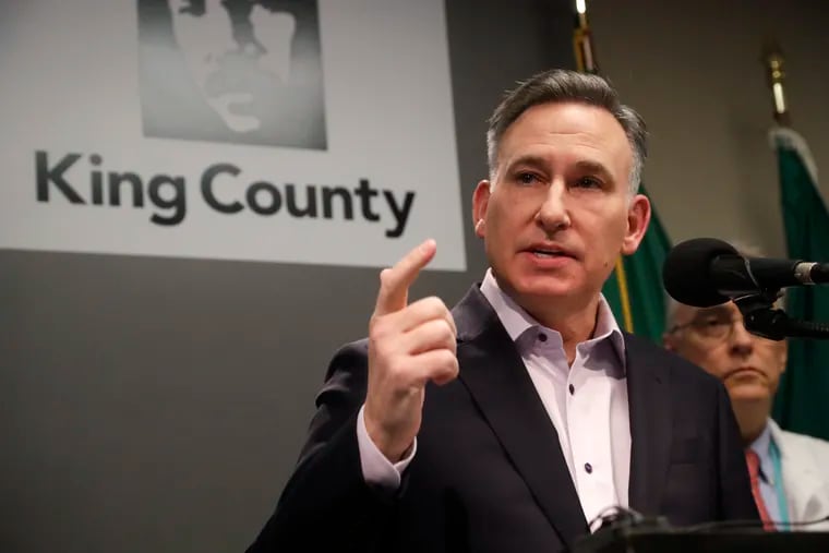 King County Executive Dow Constantine addresses a news conference Saturday after a man there became the first coronavirus death on U.S. soil.