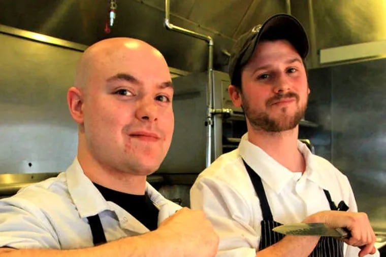 Night of the longish chef's knives: Line cook Michael Rouleau (left) and sous chef Greg Garbacz prepare to go head-to-head in the latest Sbraga challenge.