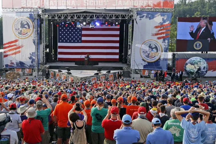 President Donald Trump waves to the crowd of scouts at the 2017 National Boy Scout Jamboree at the Summit in Glen Jean,W. Va., on Monday.