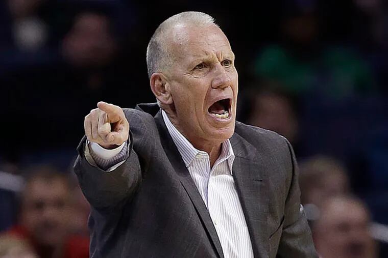 Doug Collins tries to get his team in formation during the final moments against the Charlotte Bobcats in an NBA basketball game in Charlotte, N.C., Wednesday, April 3, 2013. The Bobcats won 88-83. (Bob Leverone/AP)