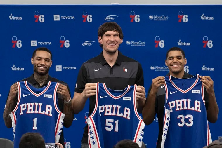 Newly acquired Philadelphia 76ers (from left) Mike Scott, Boban Marjanovic, and Tobias Harris at a news conference at the Sixers practice facility on Thursday.