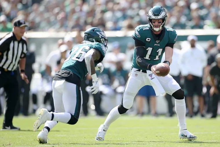 Eagles quarterback Carson Wentz and Miles Sanders hope to keep the Eagles' offense in high gear Sunday when they face the winless Jets at Lincoln Financial Field.
