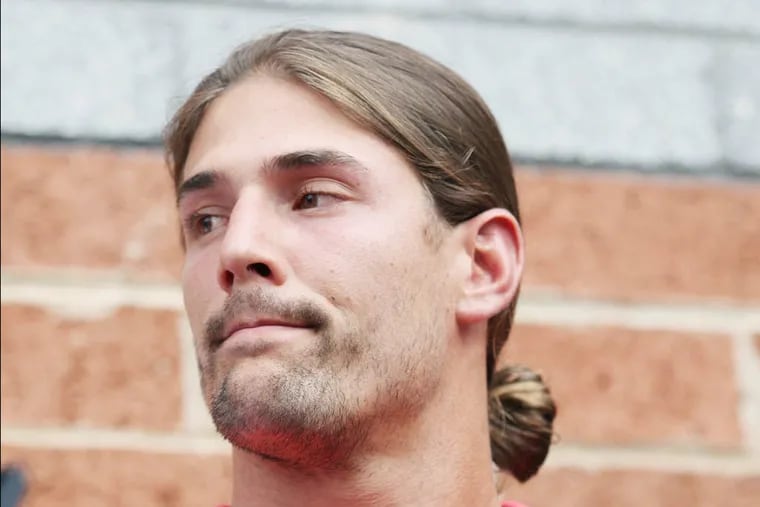 Philadelphia Eagles wide receiver Riley Cooper talks with the media, apologizing for a using a racial slur, at the NovaCare Complex in Philadelphia, Pennsylvania, on Wednesday, July 31, 2013.  (Yong Kim / Staff Photographer)