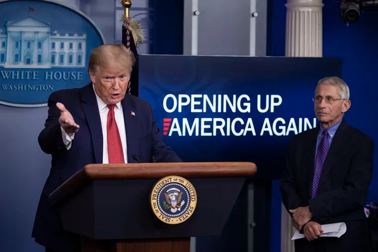 President Donald Trump speaks about the coronavirus, accompanied by Dr. Anthony Fauci, director of the National Institute of Allergy and Infectious Diseases.