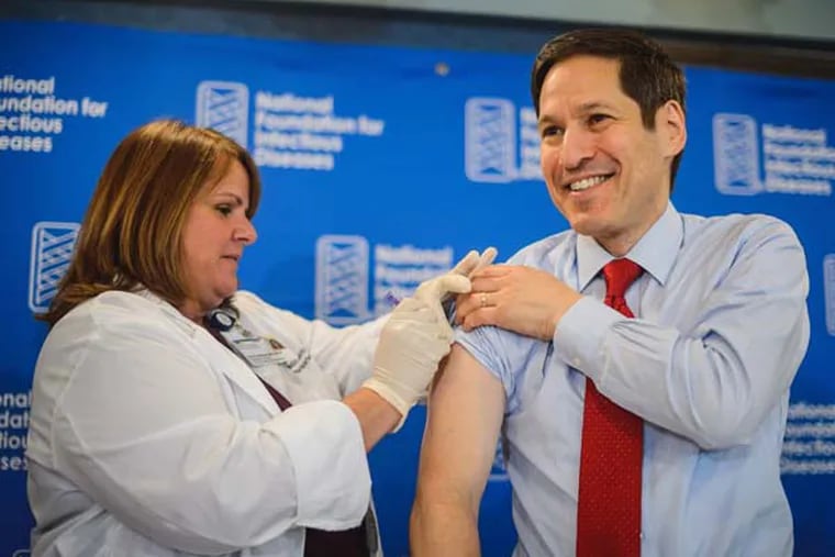Thomas Frieden, director of the Centers for Disease Control and Prevention, receives a flu shot. (Credit: Courtesy of the National Foundation for Infectious Diseases)