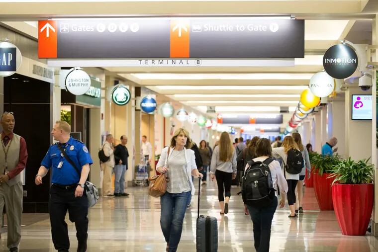 Travelers in Terminal B at Philadelphia International Airport.