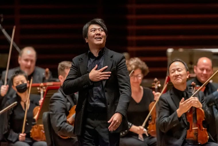 Pianist Lang Lang accepts applause on the Verizon Hall stage as the Philadelphia Orchestra opens its 123rd season Wednesday night with a reception, concert, and dinner at the Kimmel Center.