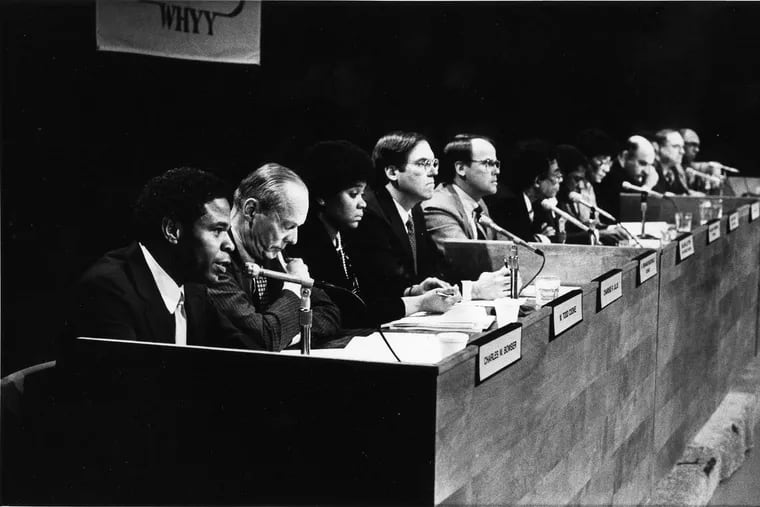 The MOVE Commission releases its findings at a WHYY news conference on March 6, 1986. In foreground, commission member Charles Bowser, an attorney, is speaking.