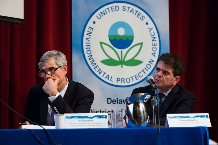 The Environmental Protection Agency's Peter Grevatt, Director of the Office of Ground Water and Drinking Water, and Cosmo Servidio, Regional Administrator for the Mid-Atlantic, listen to members of the public speak during a community meeting in Horsham to address PFAS contamination in drinking water.