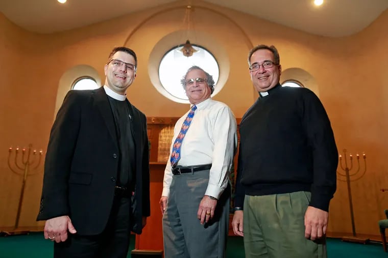 The Rev. Brett Ballenger (from left) of Prince of Peace Lutheran Church, Rabbi Gary Gans of Congregation Beth Tikvah, and the Rev. Rich LaVergetta of St. Joan of Arc Church gather.