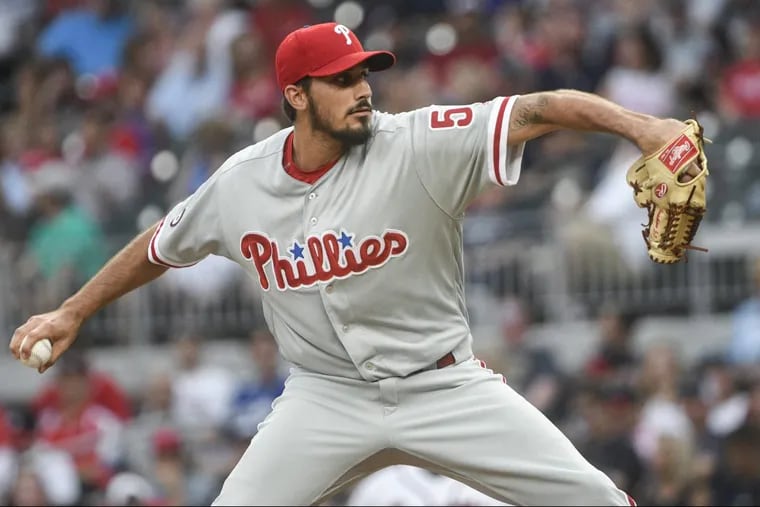 Zach Eflin pitches during the first inning against the Braves.