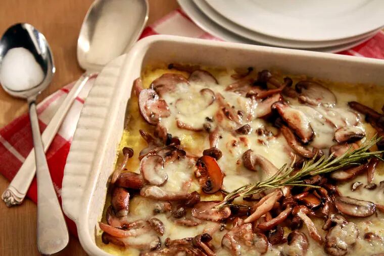 Baking polenta in the oven is simpler than traditional stirring. This version is a gratin with mushrooms and fontina.