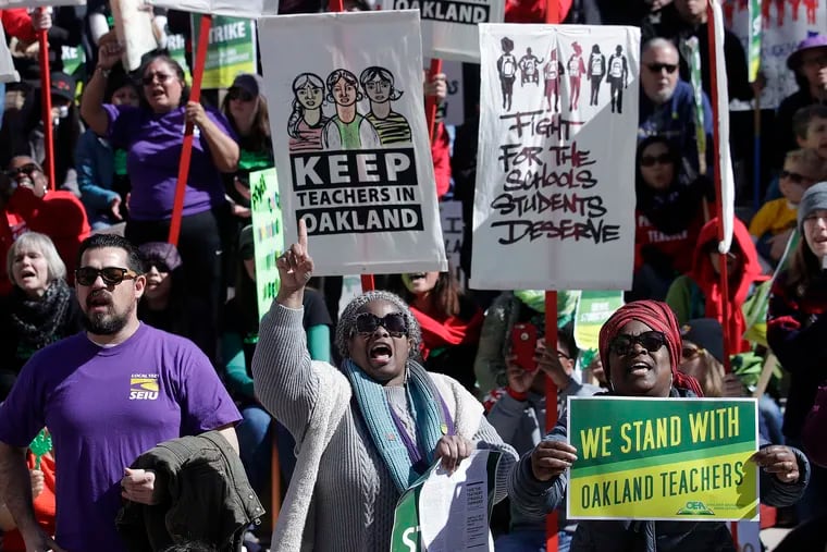 Teachers, students, and supporters rally at Frank Ogawa Plaza in front of City Hall in Oakland, Calif., on Feb. 21, 2019.