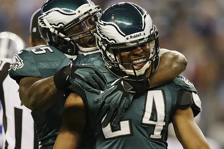 After recovering a fumble by Dallas Cowboys running back DeMarco Murray, Philadelphia Eagles cornerback Bradley Fletcher (24) celebrates with defensive end Vinny Curry during the first half of an NFL football game, Sunday, Dec. 29, 2013, in Arlington, Texas. (Tony Gutierrez/AP)