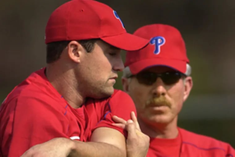 The Phillies&#0039; Pat Burrell (left) has talked with Mike Schmidt, who has criticized Burrell&#0039;s hitting. &quot;It&#0039;s not a big deal,&quot; Burrell said later.