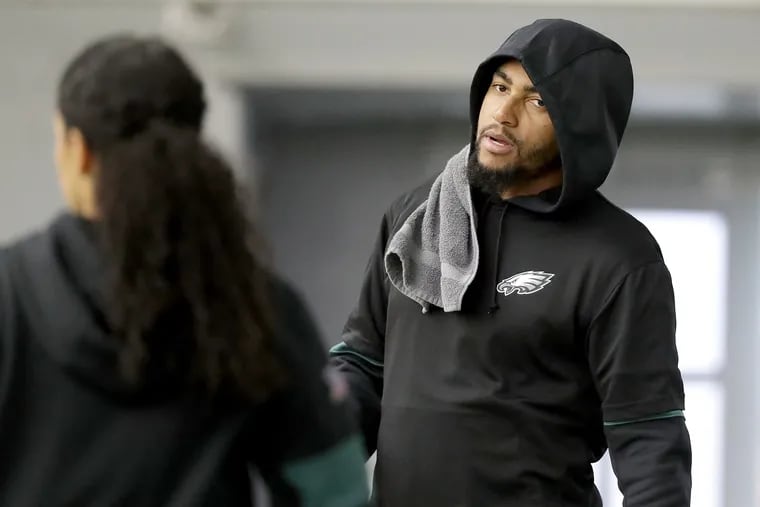 Eagles DeSean Jackson, right, leaves the practice bubble with Shireen Mansoori, left, director of rehabilitation, as the Eagles practice at the NovaCare Complex in Philadelphia, PA on October 16, 2019.