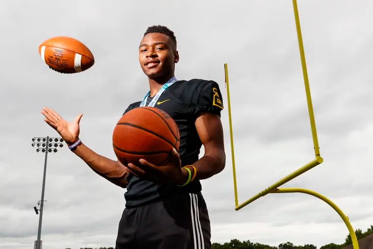 Moorestown's Nick Cartwright-Atkins is the Inquirer's senior male athlete of the year. He is a Wagner recruit in football as wide receiver. He led the Moorestown basketball team to the first state title in 60 years.