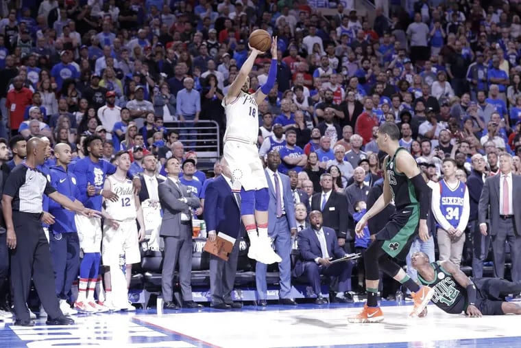 Marco Belinelli shoots the game-tying shot at the end of regulation on Saturday. The Sixers lost to the Celtics, 101-98, in overtime.