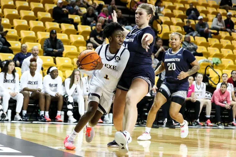 Drexel guard Keishana Washington, pictured with the ball during the CAA tournament, scored 43 points in her final game with the Dragons.